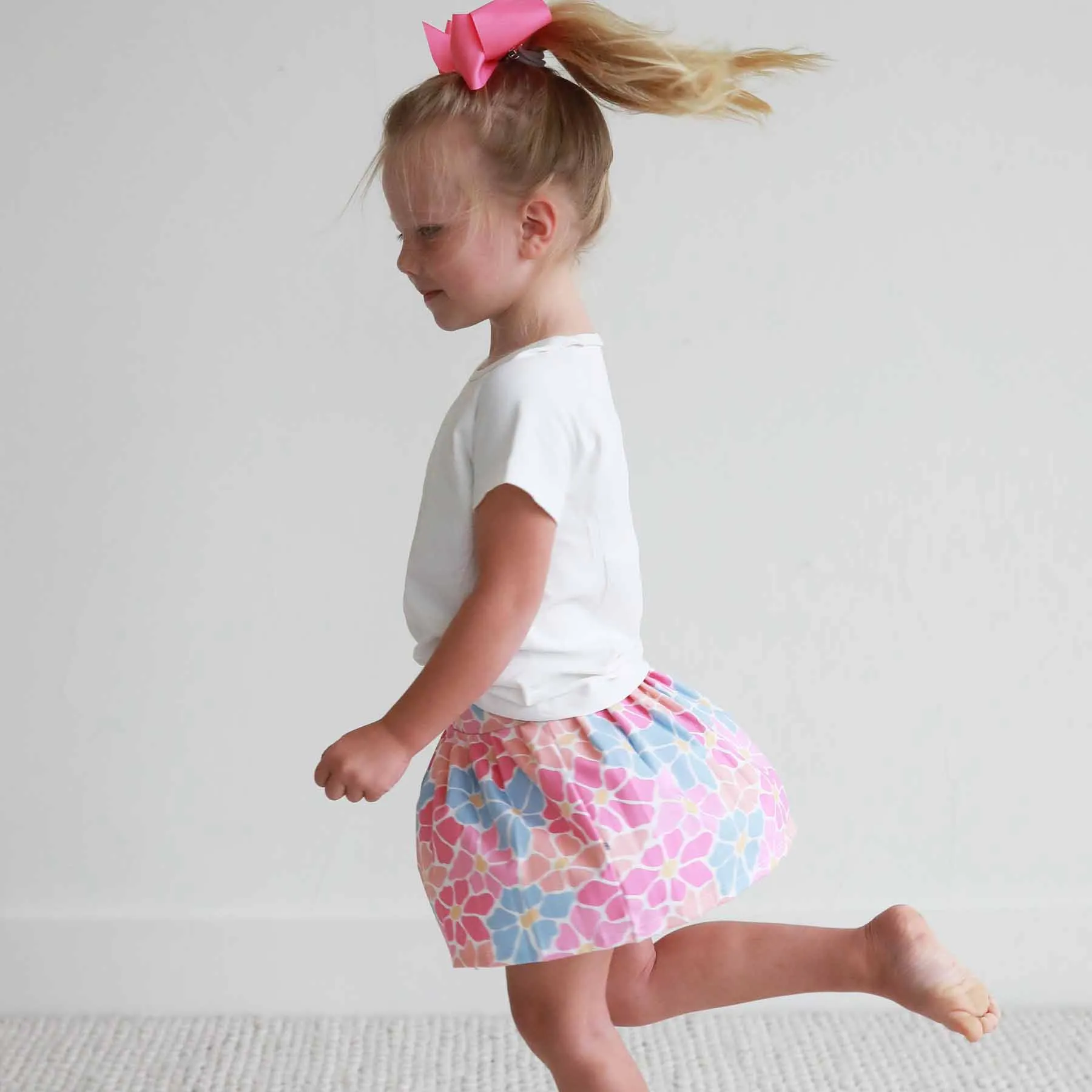 Kids CloudActive™ Athletic Pleated Skirt | Power Flowers