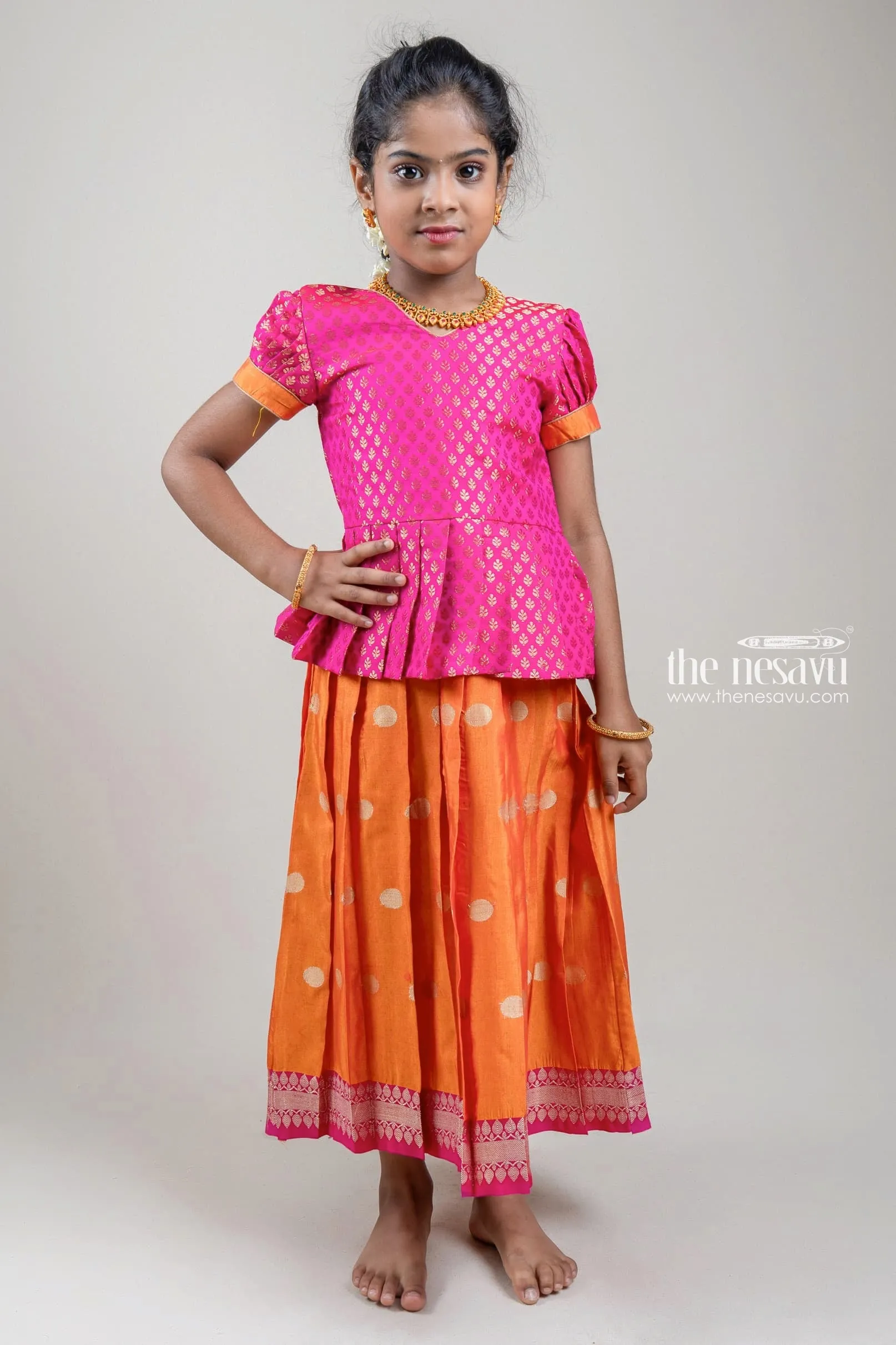 Traditional Zari Brocade Printed Pink Silk Peplum Blouse with Knife Pleated Yellow Silk Skirt for Girls GPP265B