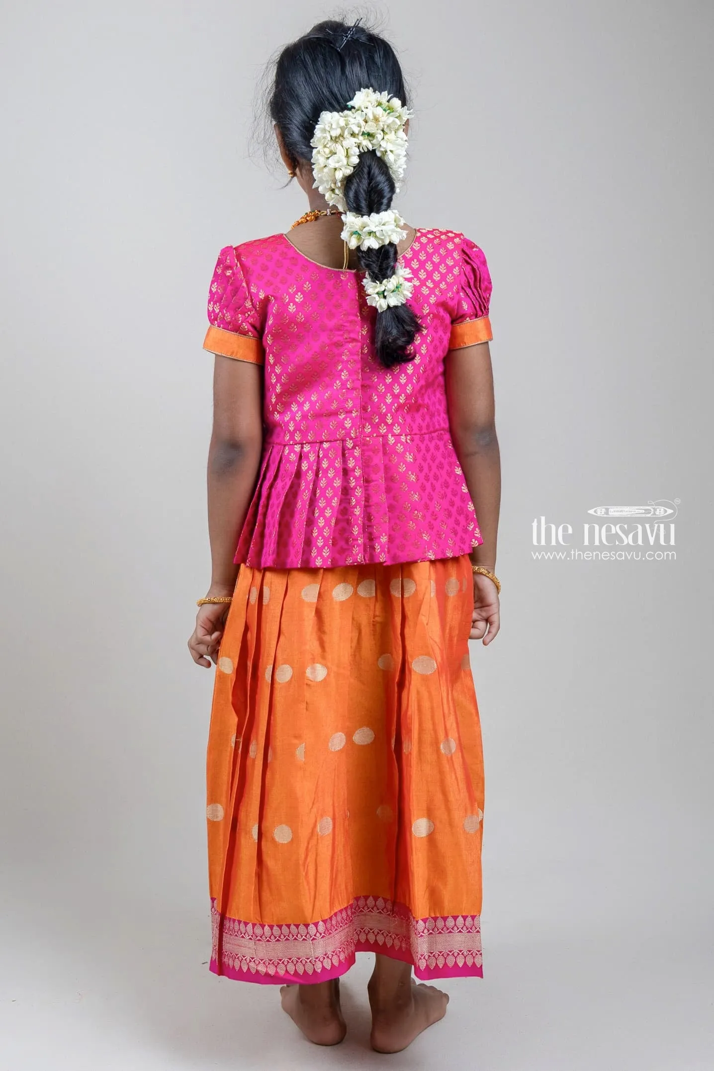 Traditional Zari Brocade Printed Pink Silk Peplum Blouse with Knife Pleated Yellow Silk Skirt for Girls GPP265B